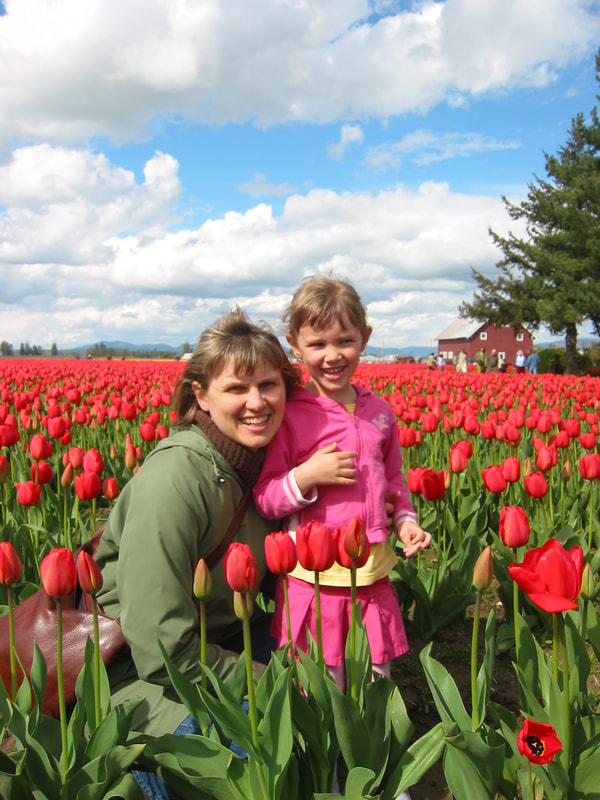 Susan and Saige in a tulip field.